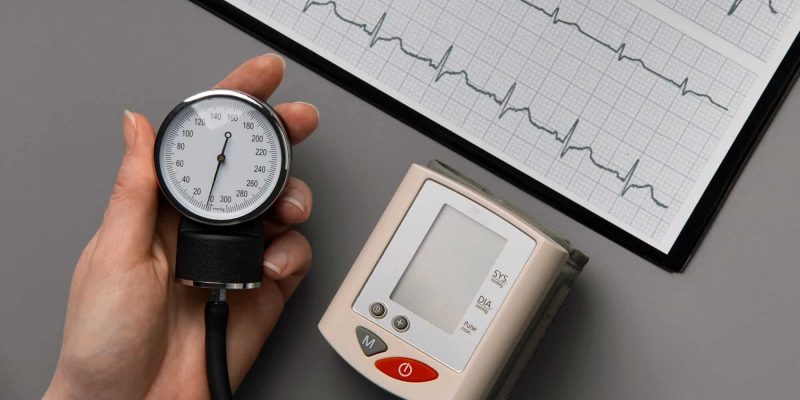 person-using-tensiometer-blood-pressure-1